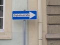 Traffic sign with the German text `EinbahnstraÃÅ¸e` which translates into `One way` in English language